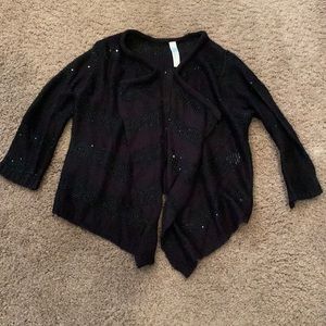 Girl’s black sweater